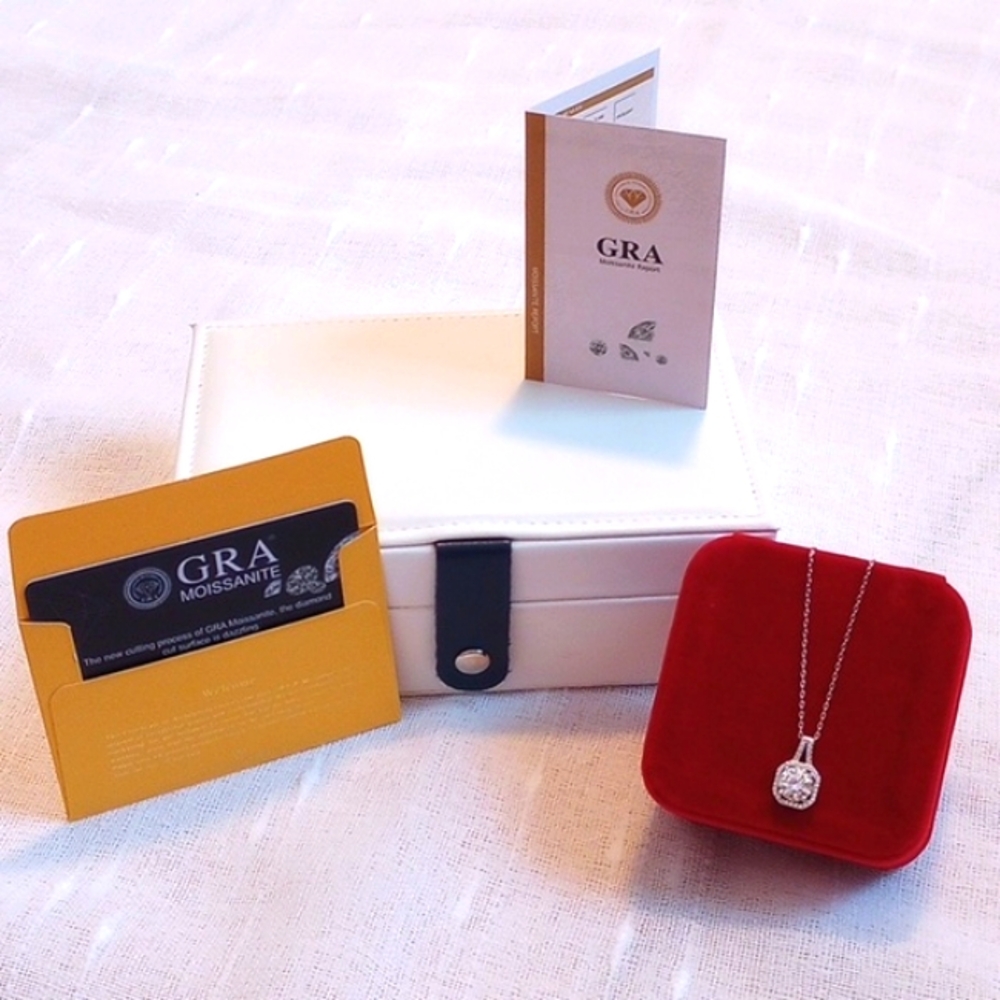 - Mossinite 2 ct. Necklace & Jewelry box